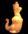 1992 Tupperware yellow dragon. Approximately 9'' high.